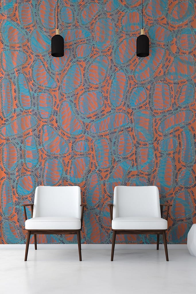The wallpaper contains a vibrant, abstract pattern with orange, blue, and black shapes.