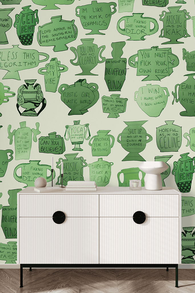 The wallpaper is green and white patterned with illustrations of various vases. It includes humorous text phrases in different fonts.