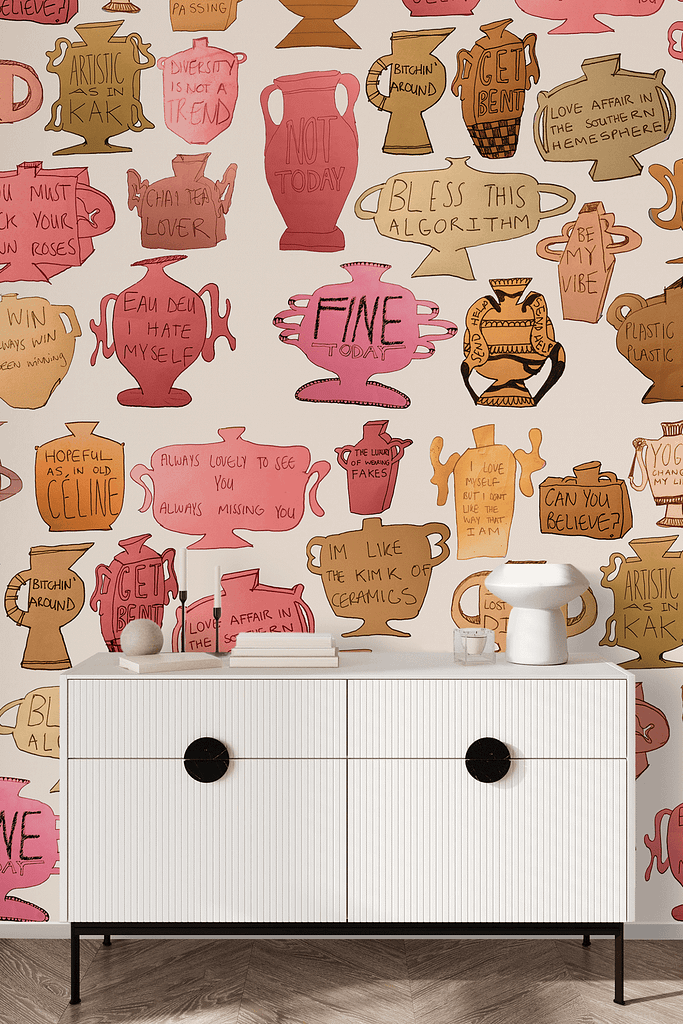 The wallpaper features colorful, patterned designs of vases, jugs, and pottery with whimsical phrases and words on a light background. The elements showcase vibrant colors such as blue, red, green, and yellow.