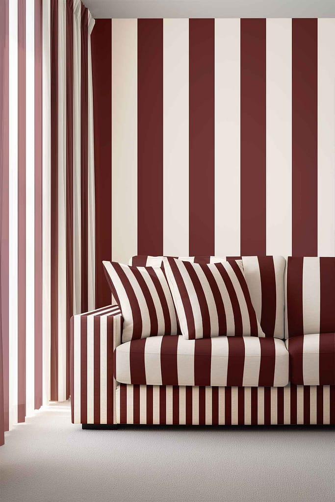 Vertical maroon and white striped wallpaper with bold, alternating bands; blue stripe accents integrated into the design.