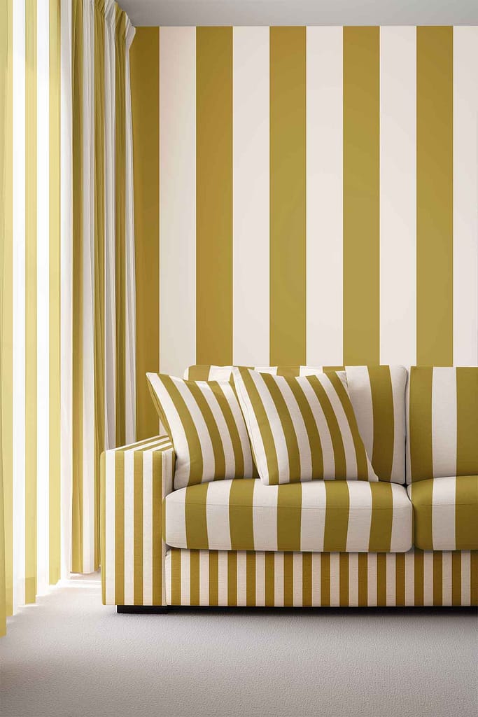 Vertical wallpaper with bold blue, yellow, and white stripes. The striped pattern alternates the three colors for a vibrant, modern look. Ideal for spaces needing colorful, graphic wallpaper design.
