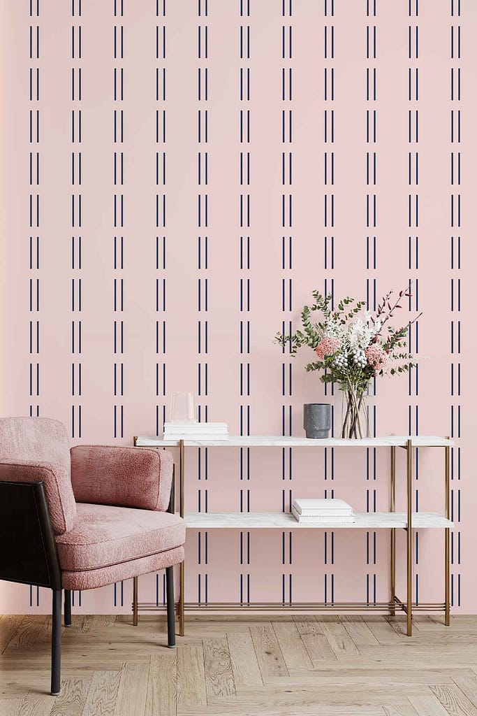 The wallpaper features a bold pink color with intricate patterns, making it the central decorative element in the room. The design highlights various shades of pink and geometric motifs, adding vibrancy and visual interest to the wall.