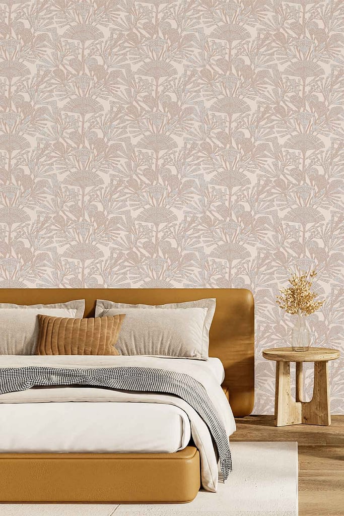Wallpaper with a repeating pale botanical pattern, featuring delicate leaves and soft cream and beige tones.