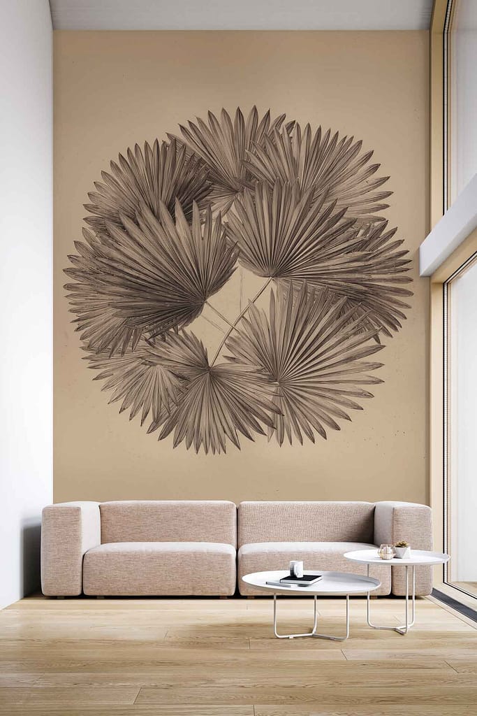 Large wall mural with overlapping palm leaves in earthy tones—taupe, tan, olive, and beige—adds texture and calm. Design features layered leaf patterns inspired by serene palettes.