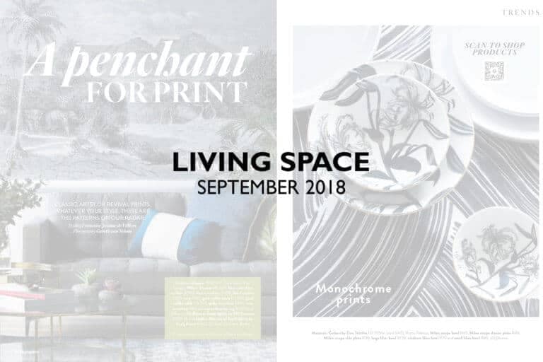 **Living Space September 2018**

**A Penchant for Print**
Discover the latest home decor trends with our focus on patterned cushions that bring life to any stylish living room sofa. This issue's spotlight is on the striking wallpaper adorned with intricate geometric designs, featuring hues of rich navy blue, vibrant mustard yellow, and subtle grey. These colors and patterns create a dynamic backdrop that effortlessly unifies any interior space.

**Monochrome Prints**
Elevate your dining experience with monochrome printed plates that add a sophisticated touch to your table setting. The bold black-and-white wallpaper contrasts sharply with these pieces, showcasing elegant damask motifs and contemporary linear patterns—perfect for those who love minimalist yet impactful decor.

Explore the world of prints and monochrome elegance in this month's edition!