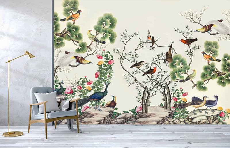 The wallpaper features a detailed mural with birds perched on flowering branches and trees set against rocky terrain. Predominant colors include shades of green, pink, white for the flowers, brown and gray for the trees and rocks.