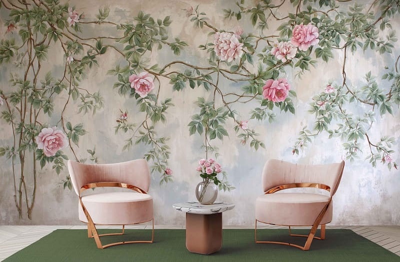 Wallpaper mural features large pink blossoms and green leaves on brown branches. Colors include shades of pink, green, and subtle touches of brown.