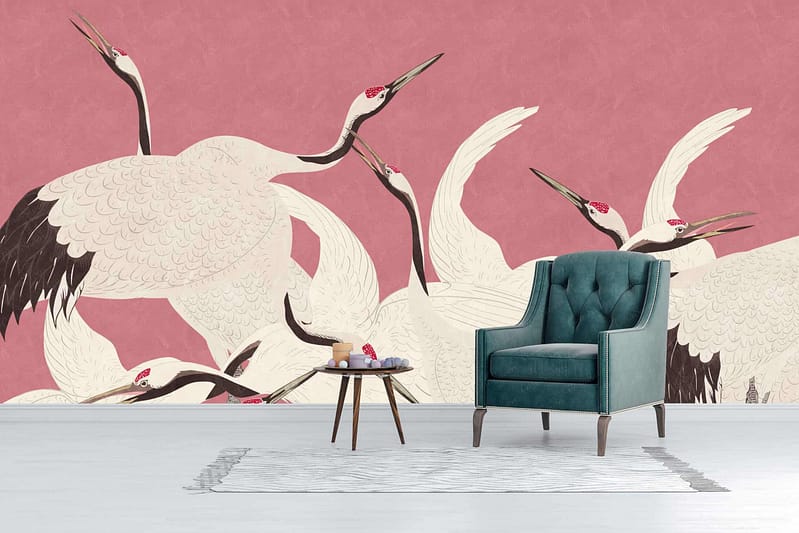 The wallpaper features white cranes with red crowns and black tails against a pink background.
