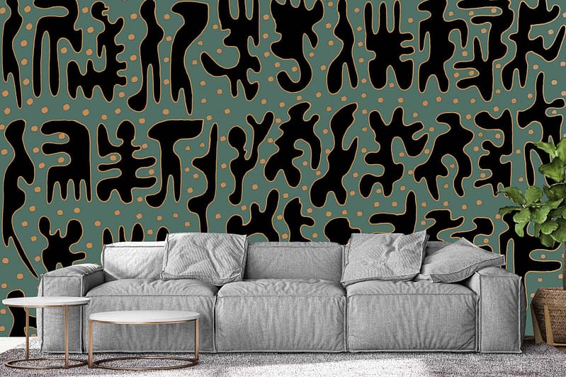 Teal background, bold abstract design, black amorphous shapes, small orange dots.