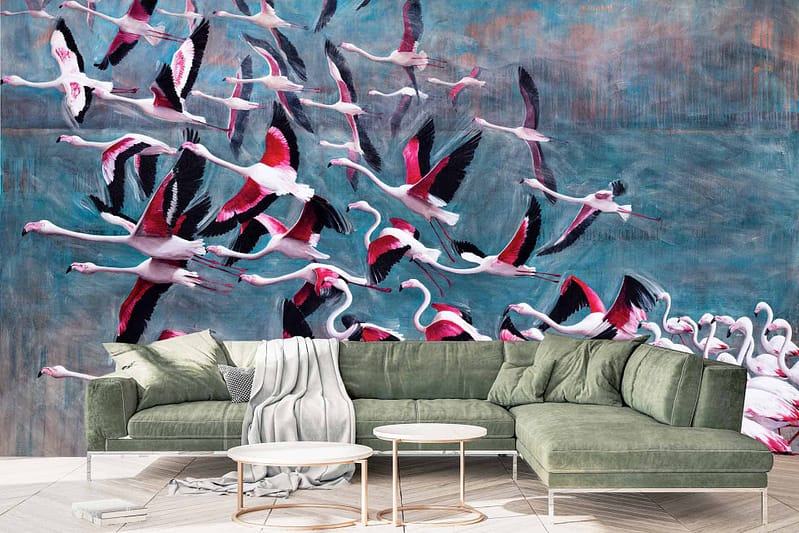 The wallpaper showcases a colorful artistic mural featuring a flock of pink and white flamingos in graceful flight against a vibrant blue and white sky, evoking the exotic beauty of Bazaruto.