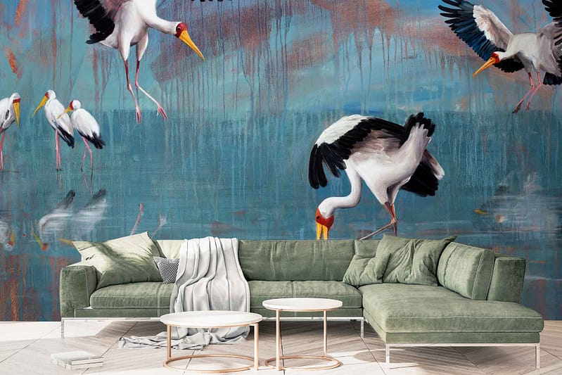 The wallpaper features storks reflecting on a blue water-like background. Elements include storks, reflections, and water texture. Colors are predominantly blue with white and gray accents from the birds.