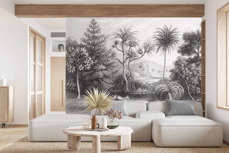 The wallpaper features a detailed black-and-white tropical forest scene, capturing intricate depictions of trees, leaves, and assorted foliage. The monochromatic palette emphasizes the contrast between dark shadows and lighter highlights, giving a timeless feel.
