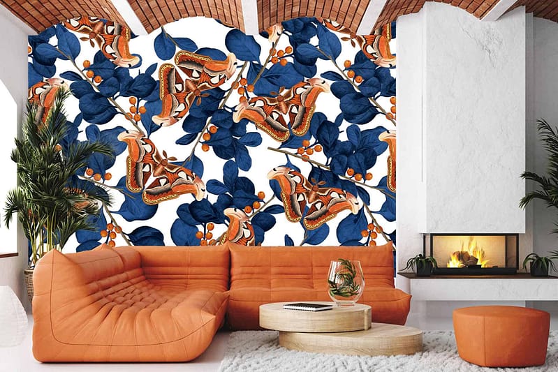 A vibrant mural with blue leaves, orange abstract shapes, and delicate butterflies.