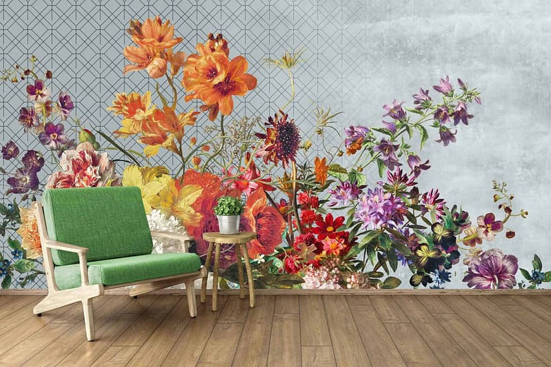 Vibrant floral mural with colorful flowers over a grey, geometric patterned wall.