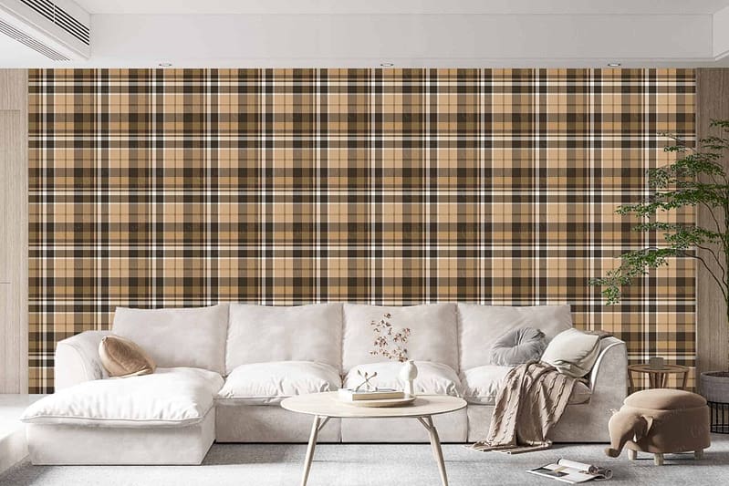 The wallpaper features a plaid pattern in shades of brown and beige. The design incorporates intersecting lines that create a classic, checkered effect. The color palette includes rich browns and soft beige hues, adding warmth and sophistication to the living room backdrop.