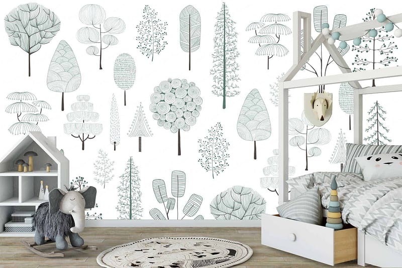 The children's room features a forest-themed wallpaper decorated with whimsical trees in soft green and gray tones. The wallpaper displays various tree shapes and patterns in shades of green and gray, creating a calming, imaginative backdrop. The soft color palette of greens and grays enhances the whimsical woodland atmosphere, making it perfect for a cozy and playful space.