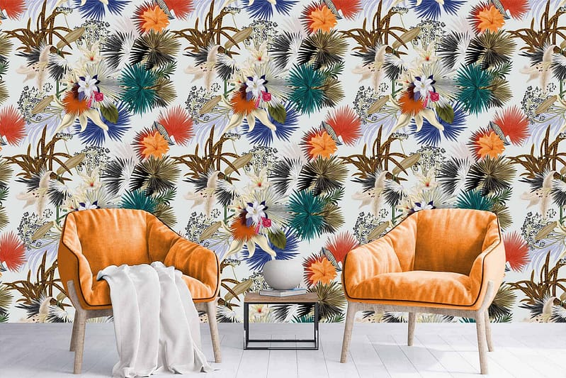 Vibrant, tropical-themed wallpaper featuring colorful leaves and flowers; hues include bright greens, yellows, oranges, pinks, and blues; elements like palm fronds and hibiscus blossoms.