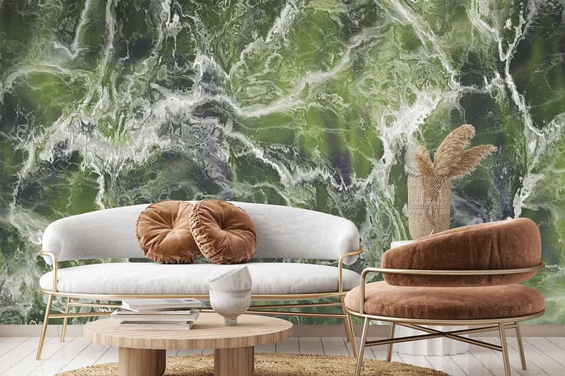 A stunning Envy Green marbled wall mural serves as the backdrop, featuring intricate patterns of lush green hues intertwined with subtle white veining and highlights of gold. This elegant wallpaper encapsulates rich, deep greens mixed with lighter emerald shades, accented by metallic gold streaks for a luxurious finish.
