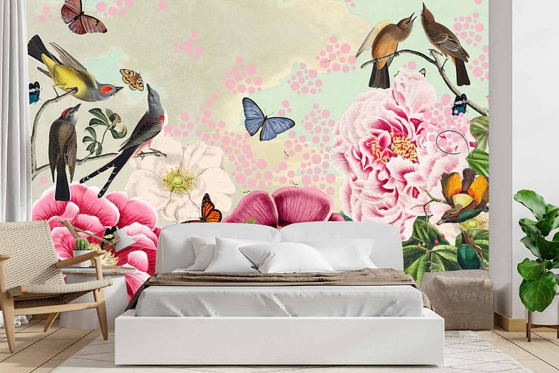 The wallpaper at Eve's Place showcases a vibrant mural featuring birds, butterflies, and colorful flowers. The elements include detailed illustrations of various bird species and intricately designed butterflies amid a lush array of vividly hued flowers in shades of red, pink, yellow, and blue.