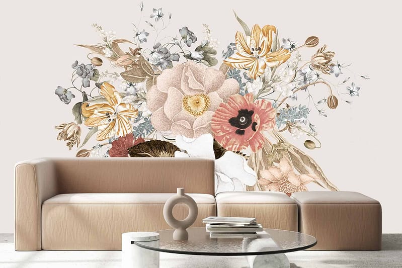A large, detailed mural features various flowers in neutral tones. It prominently displays a large pink rose and yellow lilies among other delicate blossoms. The wallpaper's color palette includes pink, yellow, beige, and soft greens.