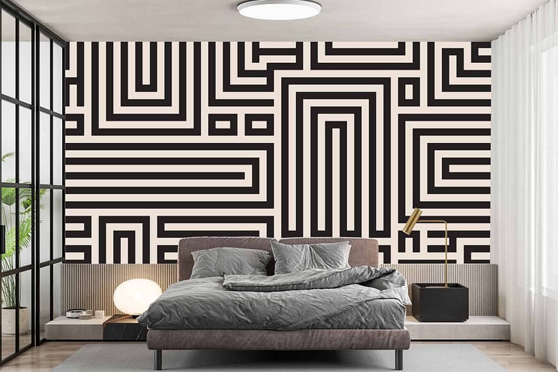 The wallpaper features a bold, black and white geometric pattern reminiscent of Maze Runner's intricate designs. Colors: Black, White. Pattern: Geometric.