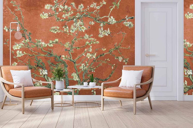 Textured warm orange background, large wall mural, blossoming branches.