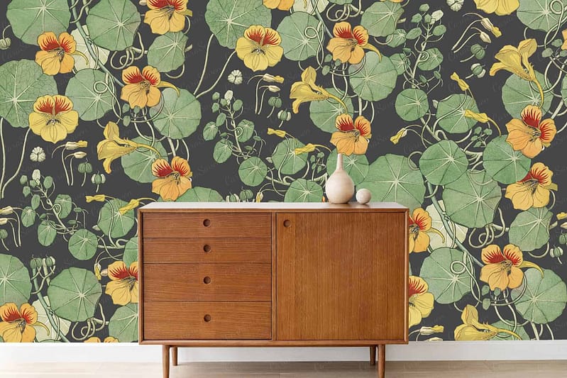 The wallpaper features large green leaves, yellow flowers, and winding vines in vibrant floral patterns.