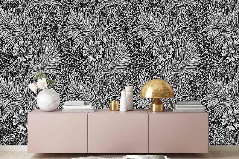 Black and white floral-patterned wallpaper; intricate floral design; monochrome color scheme; bold, contrasting elements.