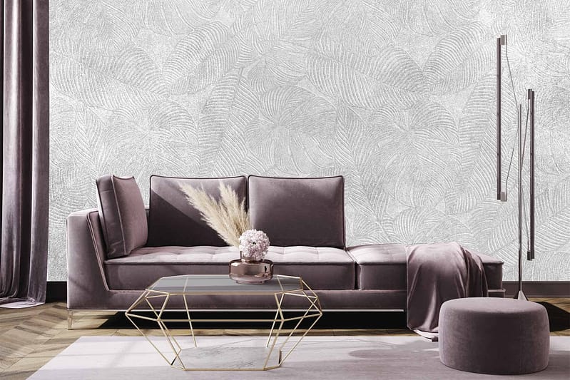 Textured wallpaper with a leaf pattern, featuring shades of green and hints of gold.