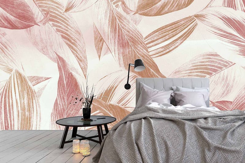 The wallpaper features a pastel leaf-patterned design. The leaves come in soft hues, adding a gentle and calming atmosphere to the room.