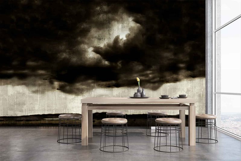 The wallpaper features a dark, abstract mural depicting storm clouds. It incorporates deep grays, blacks, and hints of blue to create a dramatic and moody atmosphere.
