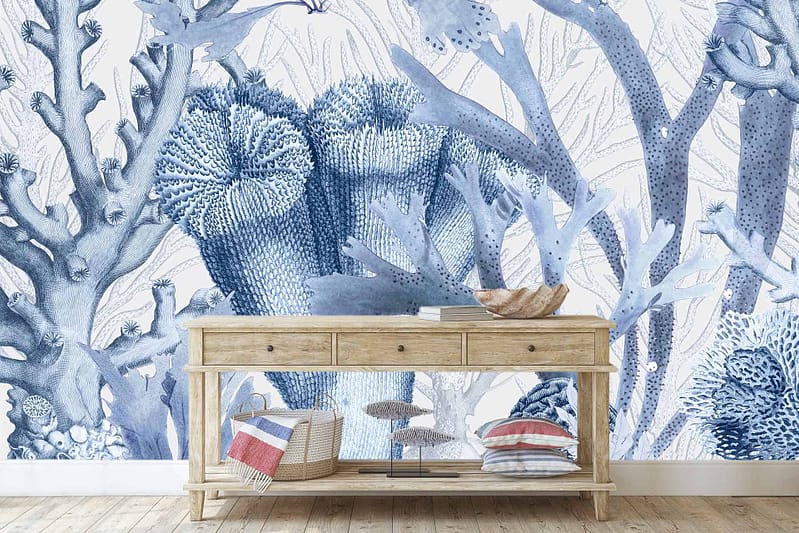 Blue and white coral reef mural, text "The Water Is Fine".