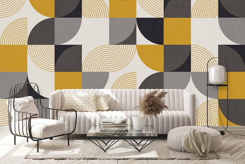 Geometric wallpaper with yellow, black, gray, and white shapes.