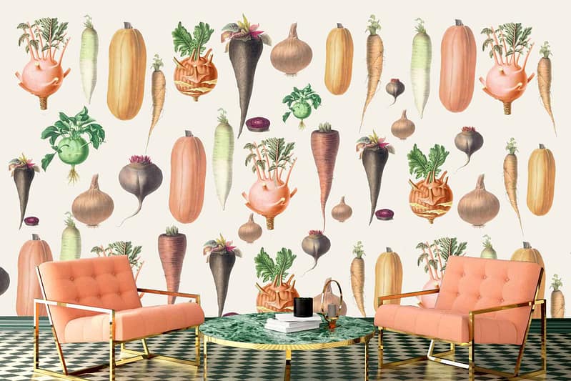 The beige wall is adorned with colorful, large-scale illustrations of various vegetables: orange carrots, red radishes, purple onions, and white turnips.