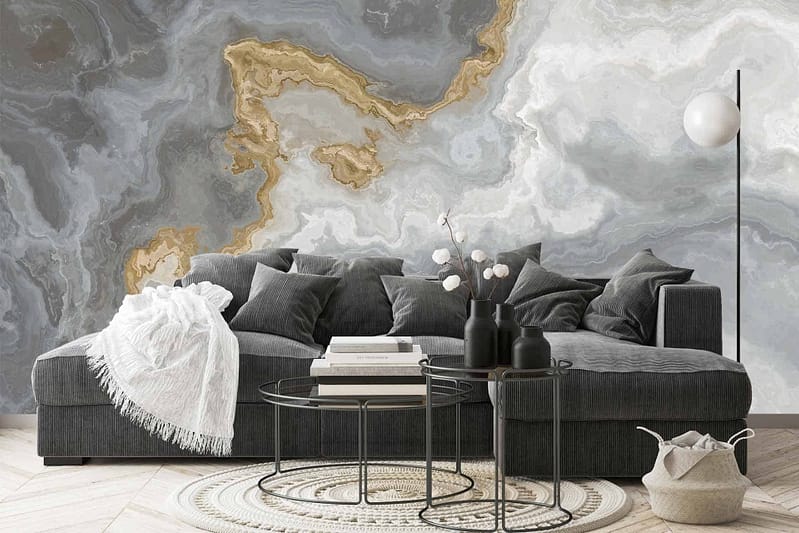 The wallpaper features an abstract design with marble-like patterns in gray, white, and gold hues.
