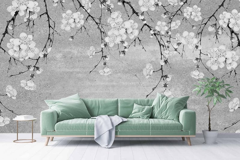 The wallpaper features a Chinoiserie mural depicting delicate white cherry blossoms on contrasting black branches.