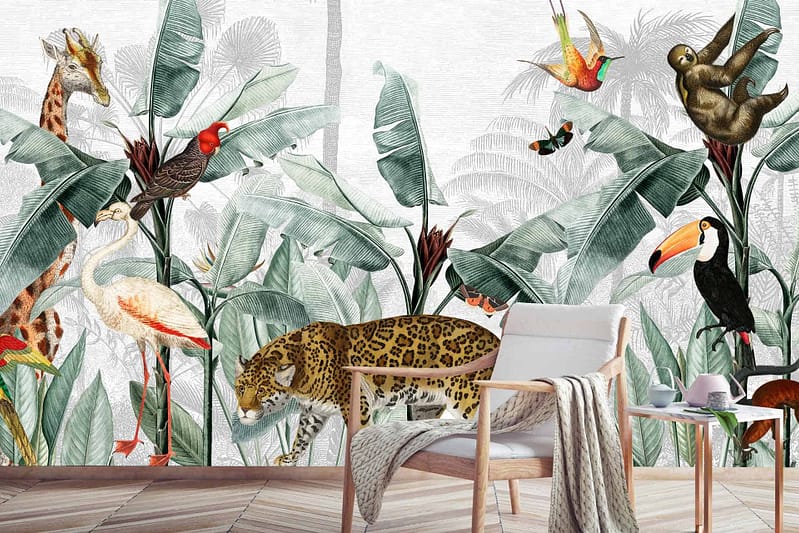 A creative mural wallpaper depicts a vibrant tropical jungle scene with a giraffe, leopard, toucan, sloth, flamingo, and various birds. Lush green foliage and palm leaves dominate the background. The foreground shows a cozy chair with a draped blanket. Elements include diverse beasts and lush greenery in rich colors like emerald green, golden-yellow, bright pinks, deep blues, and earthy browns. Search terms: tropical jungle mural wallpaper diverse animals lush foliage vibrant colors cozy chair blanket.