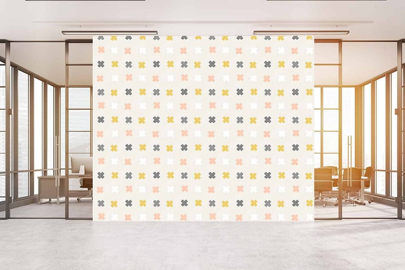 Modern office wallpaper with criss-cross pattern of multicolored flower-like shapes. Colors: pale yellow, pink, green, gray.