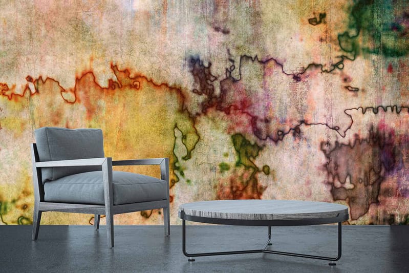 The wallpaper features vibrant, abstract art with splashes of yellow, orange, green, and purple hues by Danielles Ink.