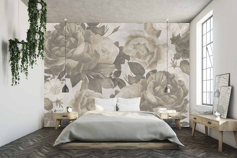 The wallpaper behind the bed is a large floral mural in shades of grey. The floral design features intricate patterns and varying grey tones, creating an elegant and sophisticated focal point for the bedroom. Searching terms: *large floral mural*, *shades of grey*, *intricate patterns*.