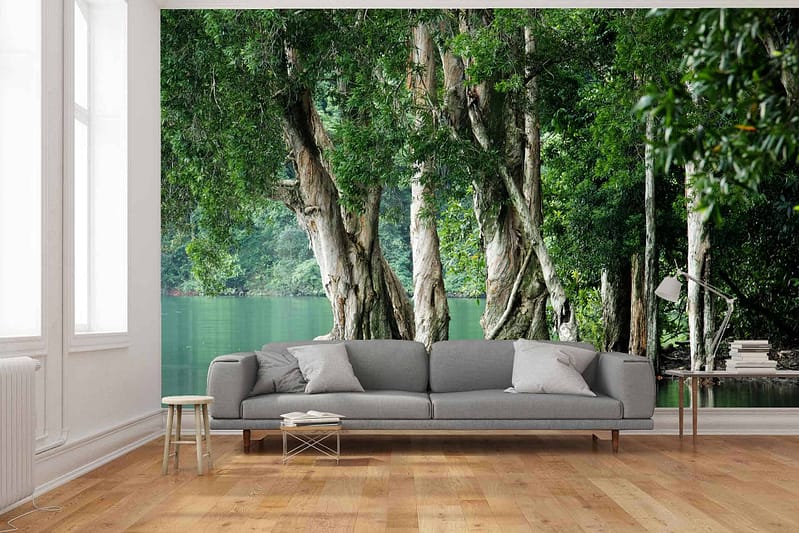 Large mural, deep jungle, lush tall trees, serene lake, green foliage, vibrant greens, touches of blue water.