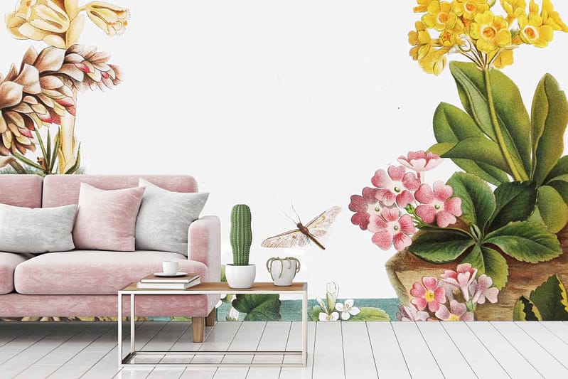 The white wall is adorned with large, colorful botanical illustrations featuring vibrant hues. The wallpaper design includes a variety of plant species with detailed leaves and flowers in shades of green, pink, yellow, and blue.