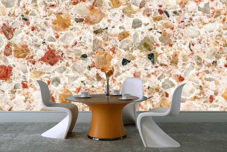 Vibrant, multicolored stone wall featuring shades of red, blue, green, yellow, and orange.