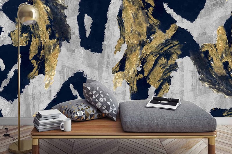 Abstract wall mural with bold navy blue, gold, and white brush strokes.