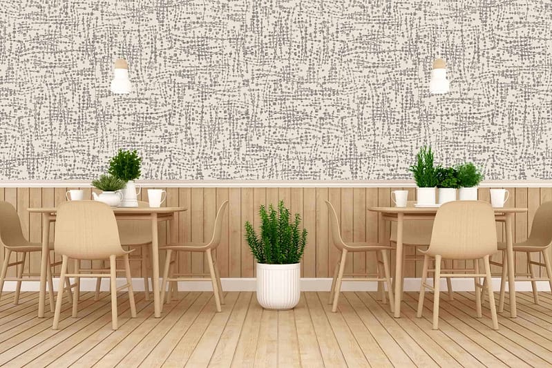 The wallpaper features a textured grey and white pattern. This combination creates a serene and subtle backdrop, integrating with the light wood planks on the floor. The grey adds depth while the white brings brightness, perfect for echoing the Intombi design ambiance.