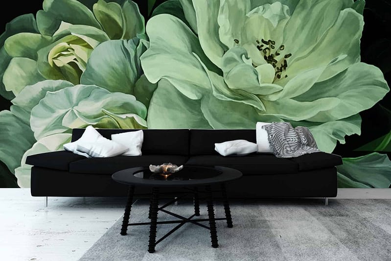 The large mural features lush green peony flowers, bringing a bold nature-inspired accent to the room. The wallpaper showcases varying shades of green, punctuated by intricate peony patterns, exuding Kiss Me Kate's vibrant charm.