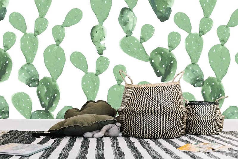 The wallpaper features large, vibrant green cactus illustrations on a white background, evoking the spirit of Klein Karoo.