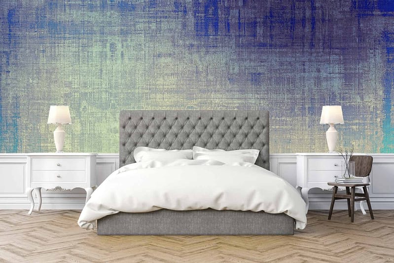 Textured blue and yellow gradient wall.