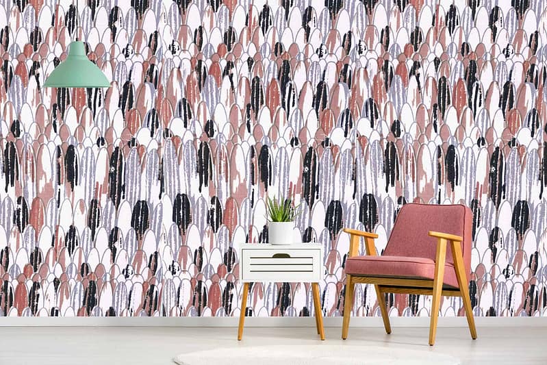 The wallpaper in the living room corner is modern and abstract, featuring shades of white, pink, and black. The pattern consists of various geometric shapes and fluid lines for a contemporary look.
