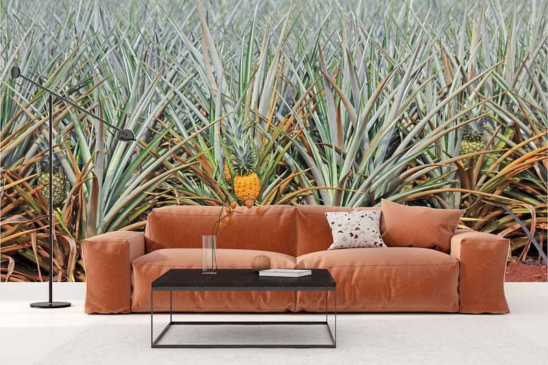 A wallpaper features an expansive mural with lush pineapple fields and tall pine trees. The scene is vibrant and tropical, incorporating elements from an exotic town. Colors include various shades of green, yellow, and brown.